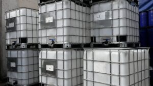 Sulphuric acid Stacked 1000L IBC totes ready for export - India